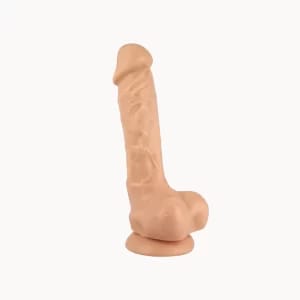 Alabaster Silk dildo on light beige background